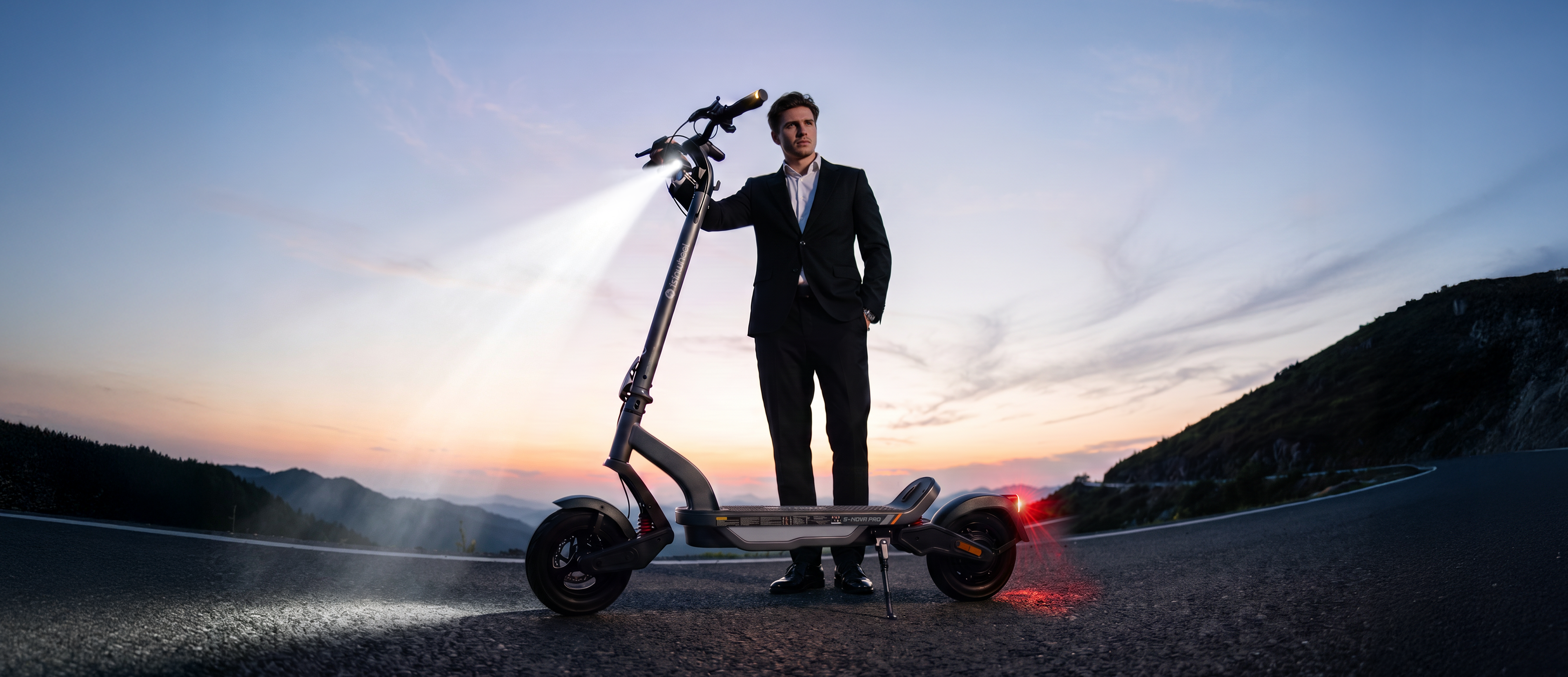 isinwheel S Nova Pro electric scooter with adjustable headlight at dusk